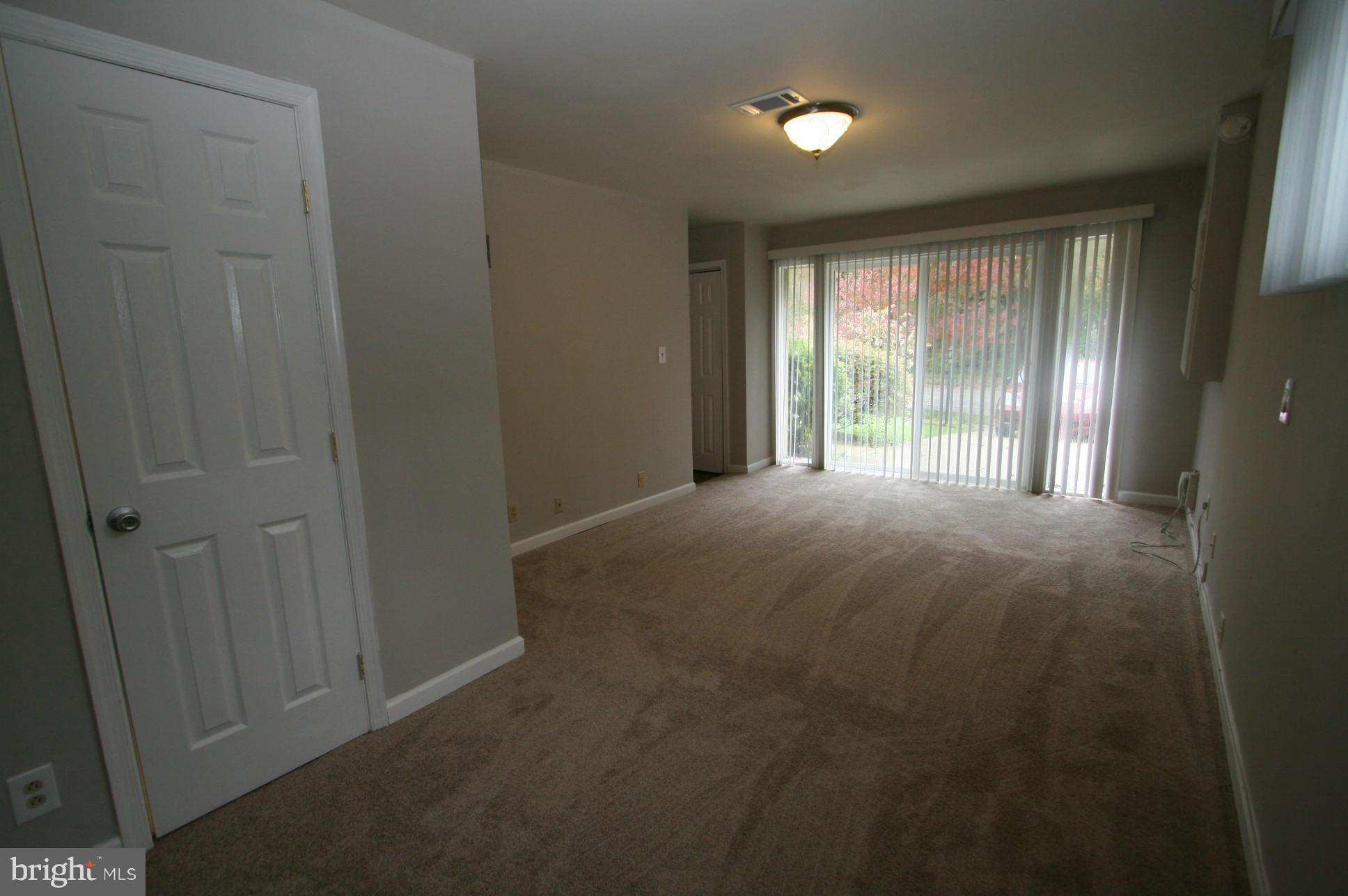 5313 Lightning View Road Columbia, MD 21045 - Photo 9 of 23 Living Room with powder room