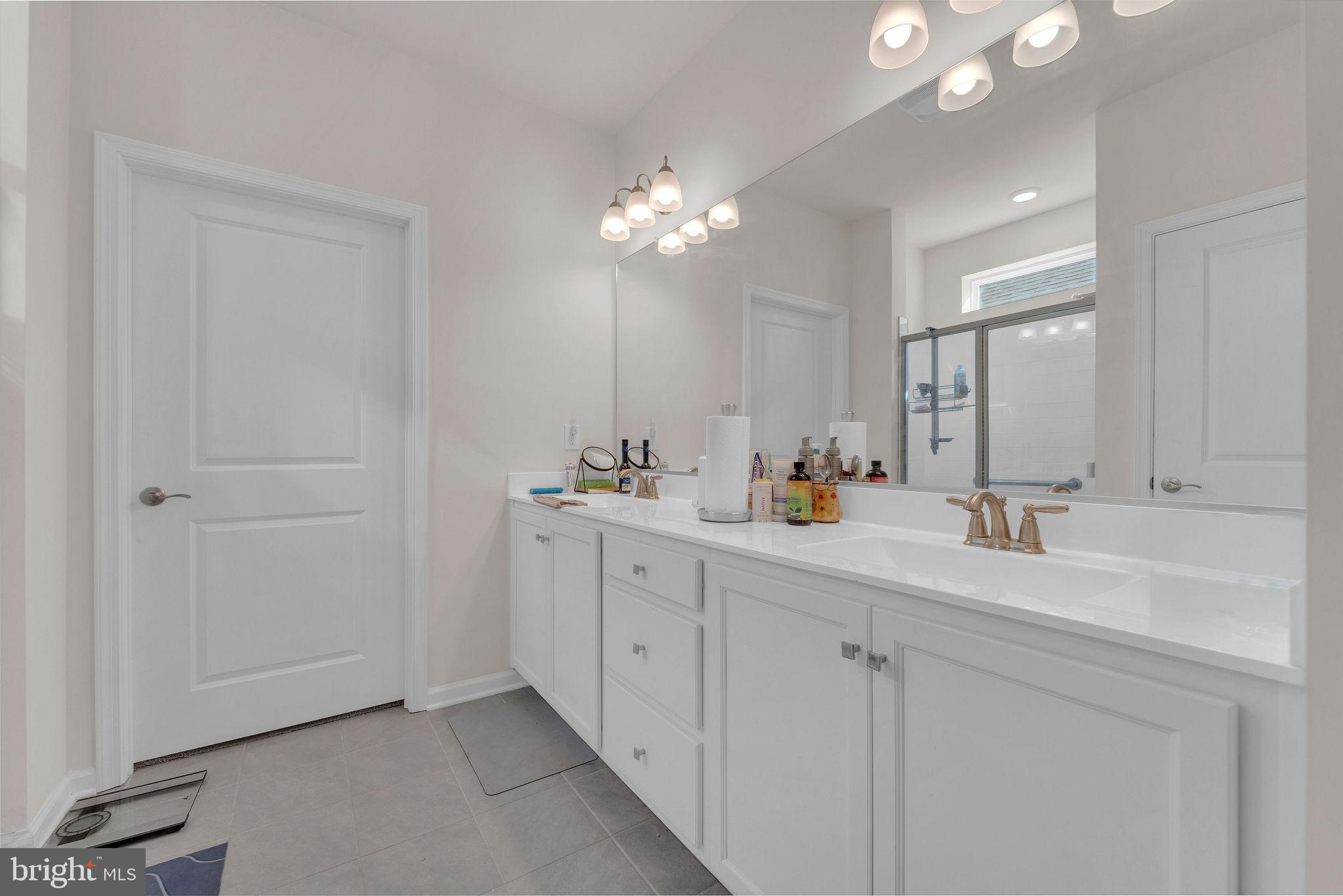 31 Walton Way Delanco, NJ 08075 - Photo 16 of 30 a bathroom with a sink vanity and mirror