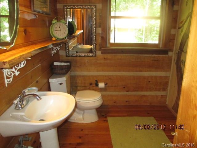 820 Brian Road, Unit 3 Clover, SC 29710 - Photo 12 of 24 a bathroom with a sink mirror and toilet