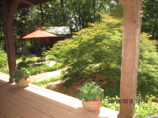 820 Brian Road, Unit 3 Clover, SC 29710 - Photo 22 of 24 a view of a garden with an umbrella