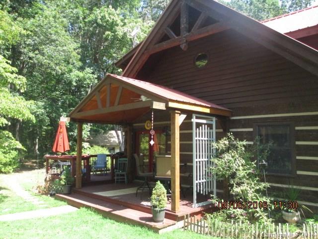 820 Brian Road, Unit 3 Clover, SC 29710 - Photo 5 of 24 a patio with table and chairs and potted plants