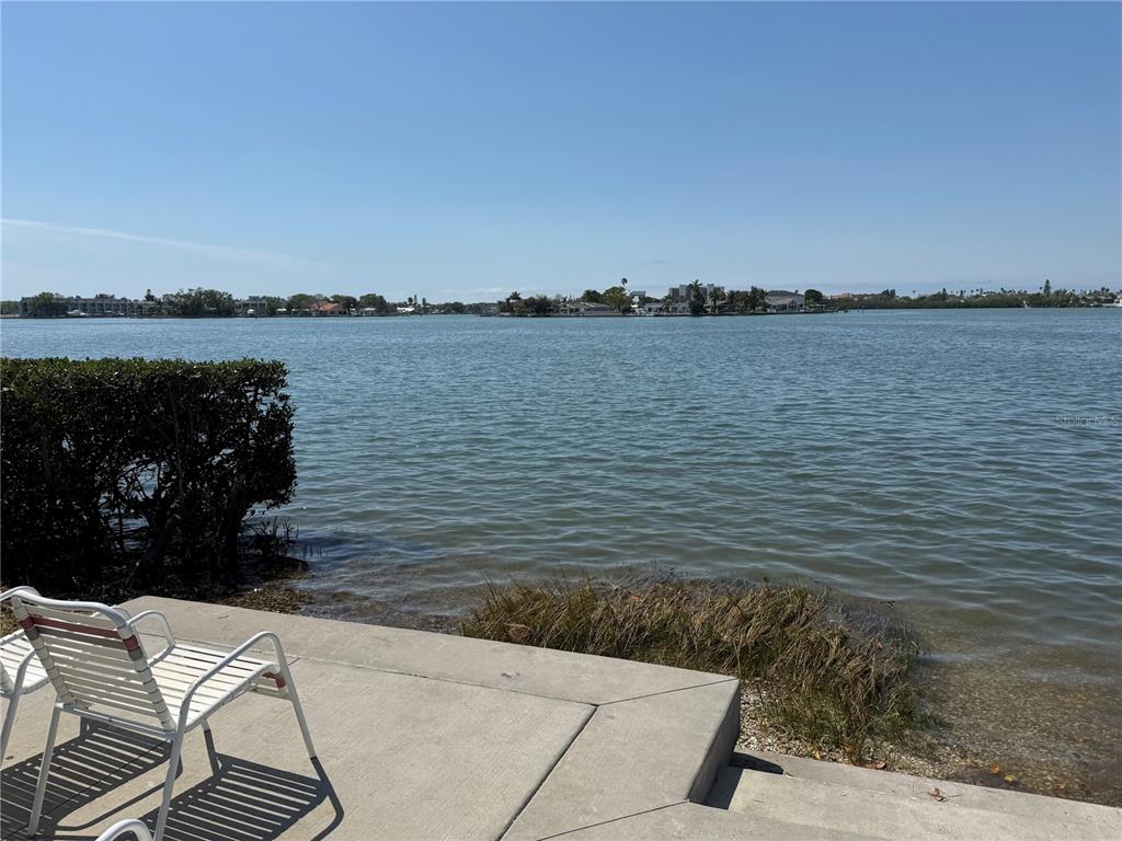 12760 Indian Rocks Road, Unit 1024 Largo, FL 33774 - Photo 31 of 35 a view of a lake with a outdoor space