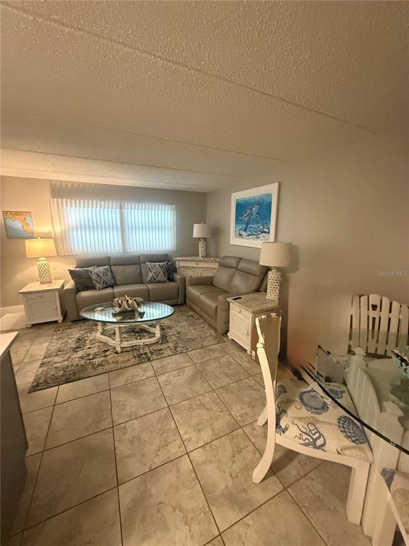 12760 Indian Rocks Road, Unit 1024 Largo, FL 33774 - Photo 10 of 35 a living room with furniture