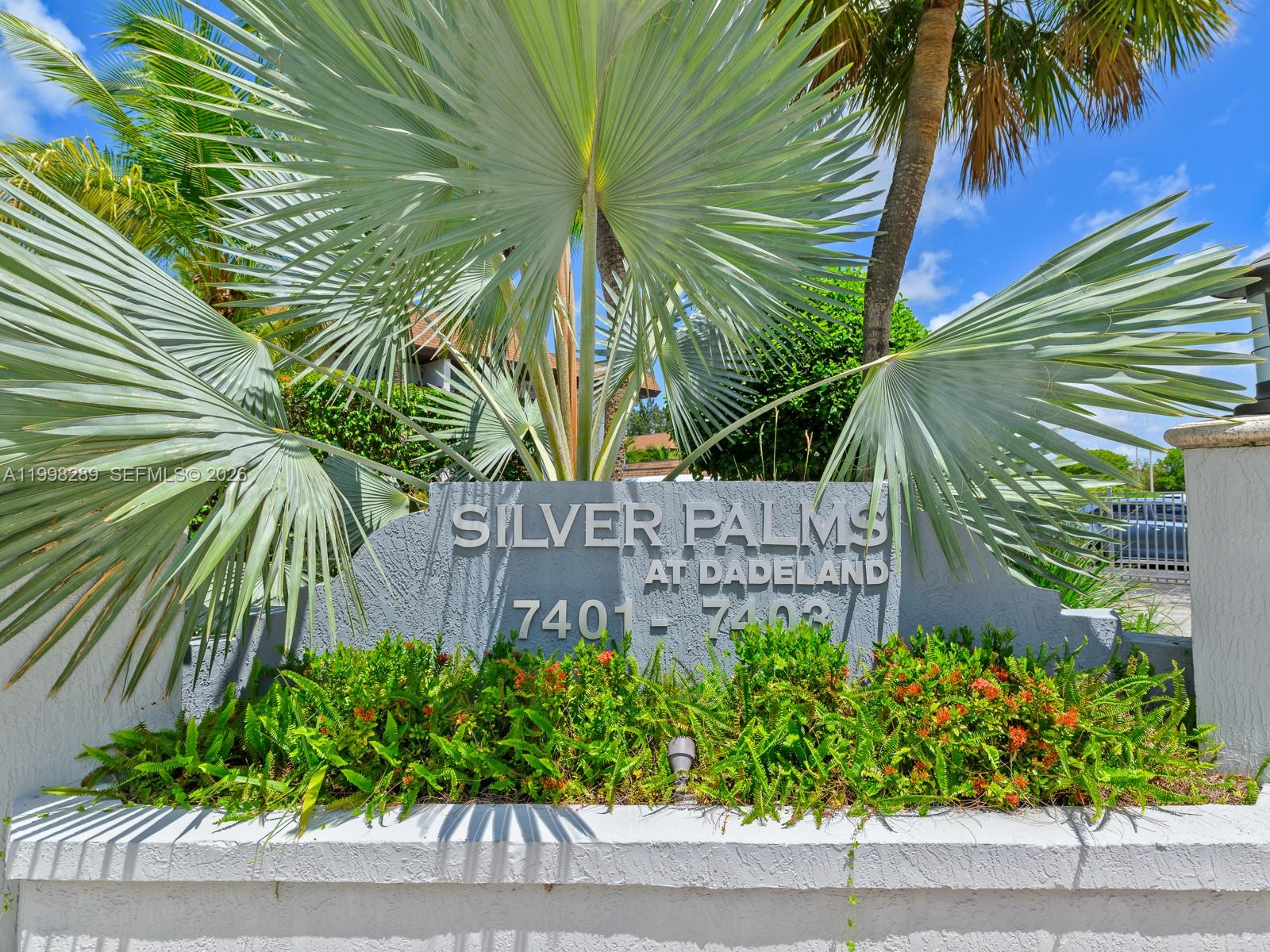 7403 Southwest 82nd Street, Unit 201N Miami, FL 33143 - Photo 1 of 43 a sign that is on the side of a road