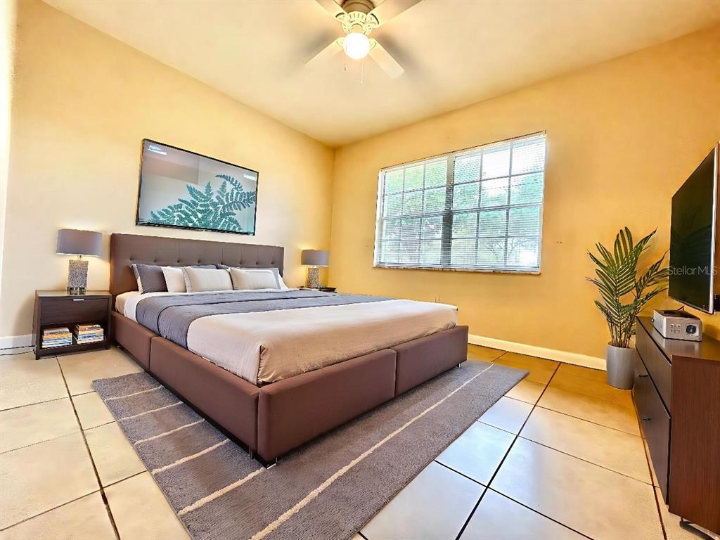 530 Park Avenue, Unit 532 Umatilla, FL 32784 - Photo 15 of 26 a spacious bedroom with a bed and a window