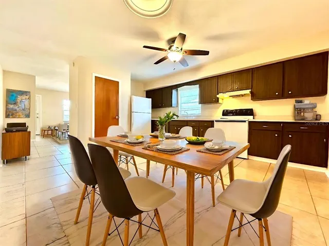 a view of a dining room with furniture
