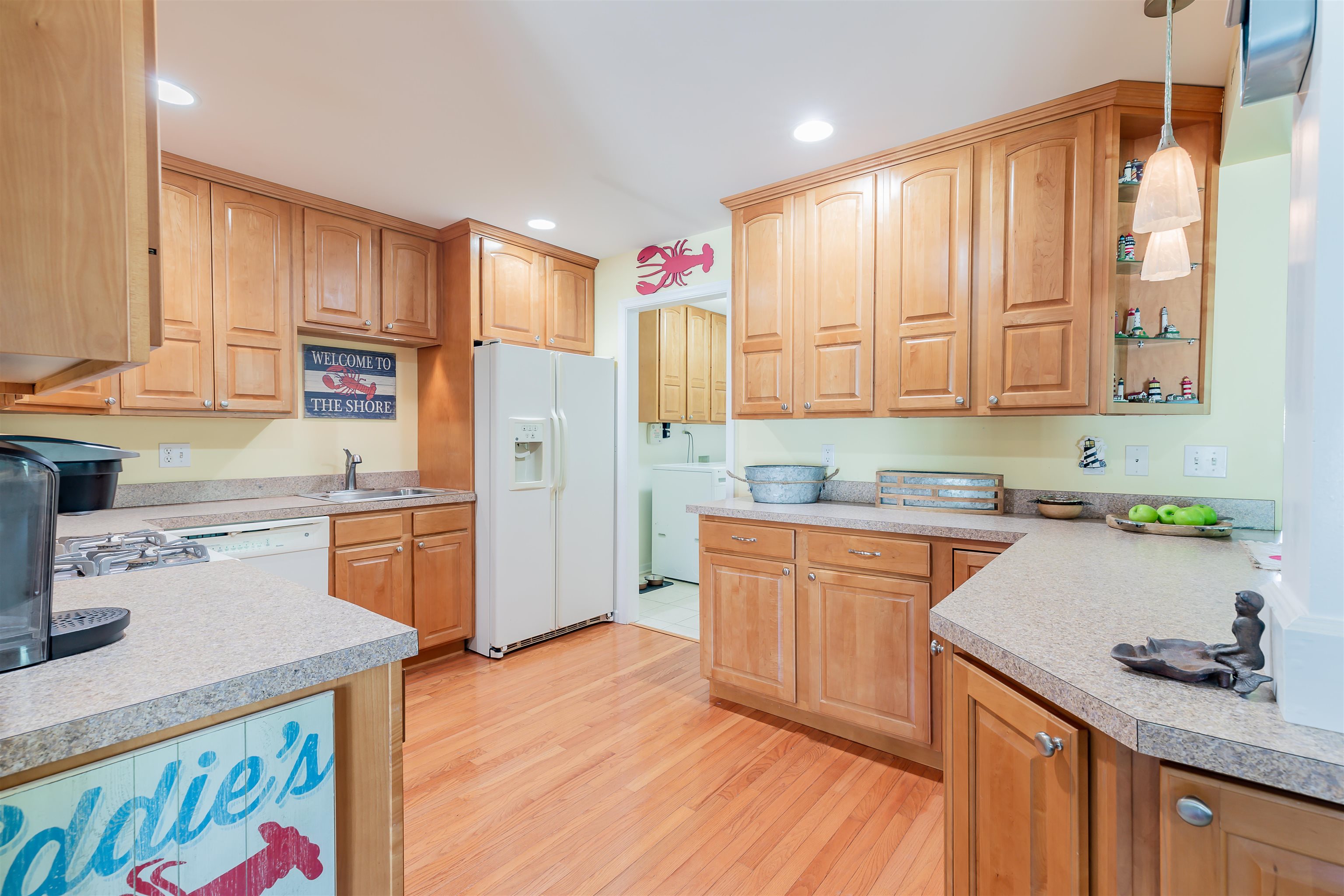 3125 Shunpike Road, Unit A Rio Grande, NJ 08242 - Photo 16 of 41 a kitchen with stainless steel appliances granite countertop a sink stove and refrigerator