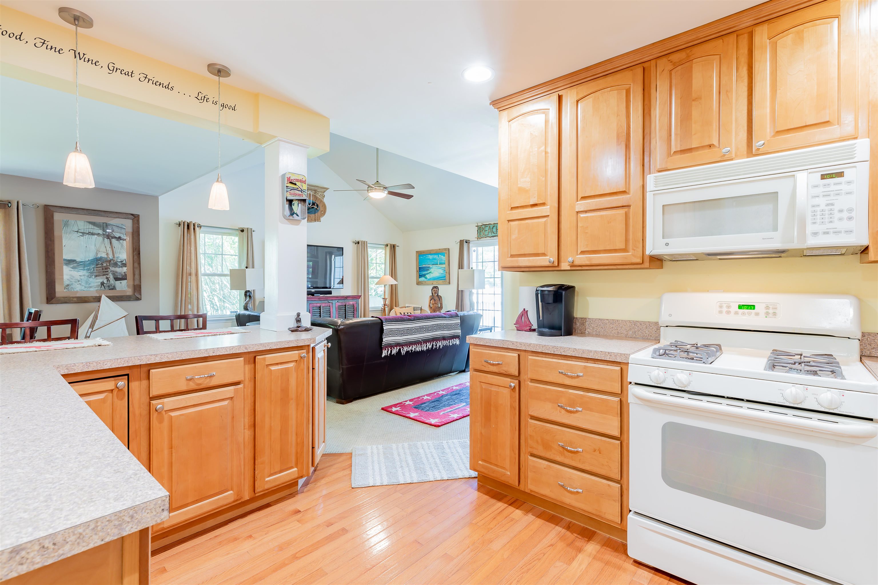 3125 Shunpike Road, Unit A Rio Grande, NJ 08242 - Photo 17 of 41 a kitchen with stainless steel appliances granite countertop a stove and cabinets