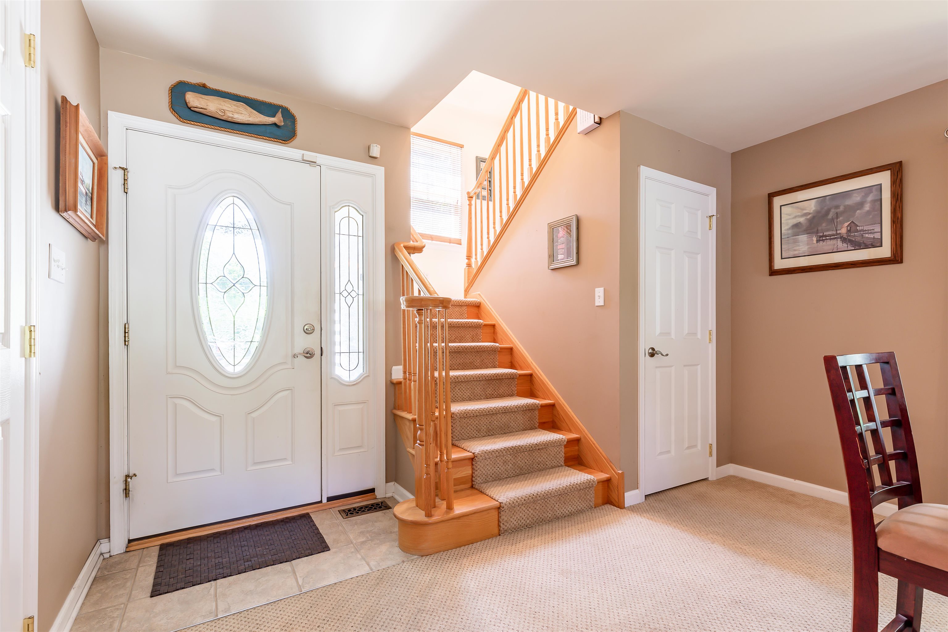 3125 Shunpike Road, Unit A Rio Grande, NJ 08242 - Photo 23 of 41 a view of a hallway with entryway wooden floor and front door