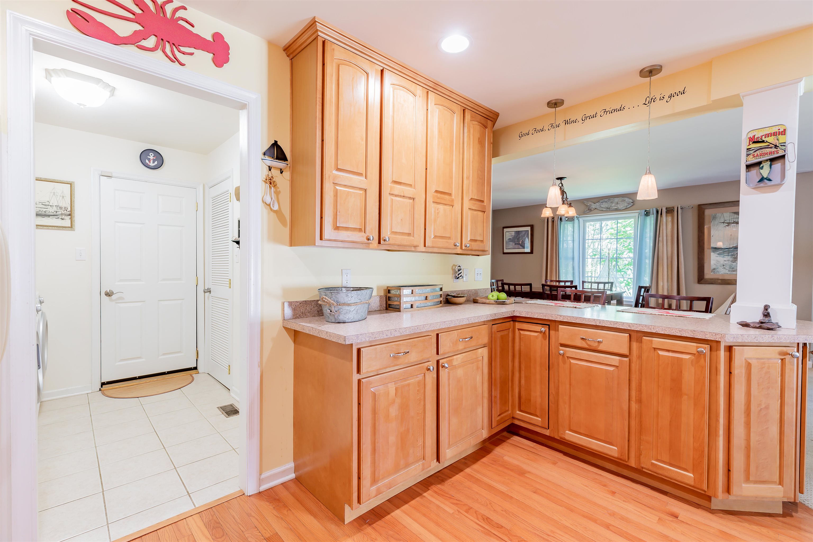 3125 Shunpike Road, Unit A Rio Grande, NJ 08242 - Photo 32 of 41 a kitchen with stainless steel appliances granite countertop a sink and cabinets