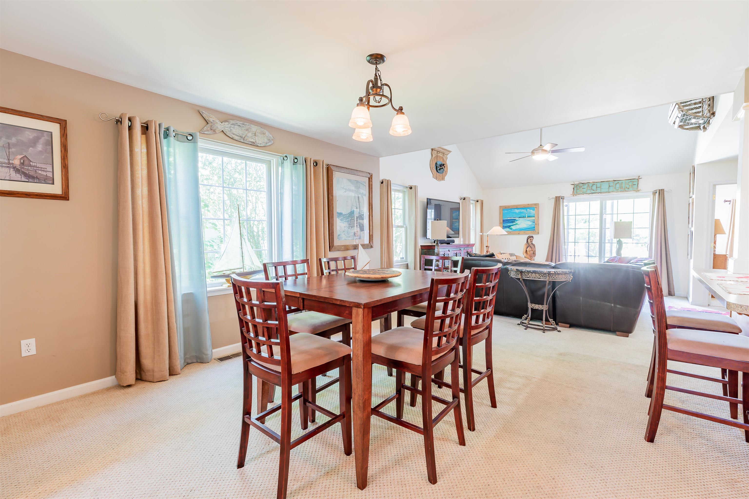 3125 Shunpike Road, Unit A Rio Grande, NJ 08242 - Photo 4 of 41 a view of a dining room with furniture window and wooden floor