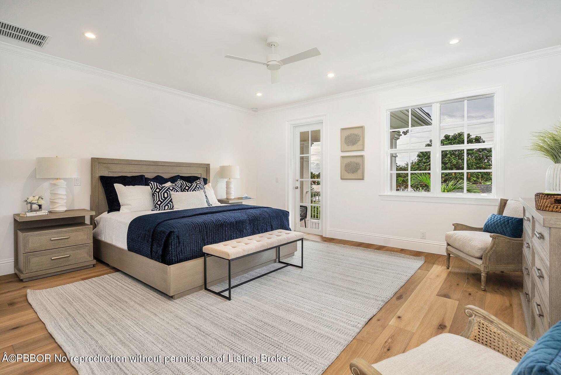 344 Churchill Road West Palm Beach, FL 33405 - Photo 16 of 41 a bedroom with a large bed and a couch