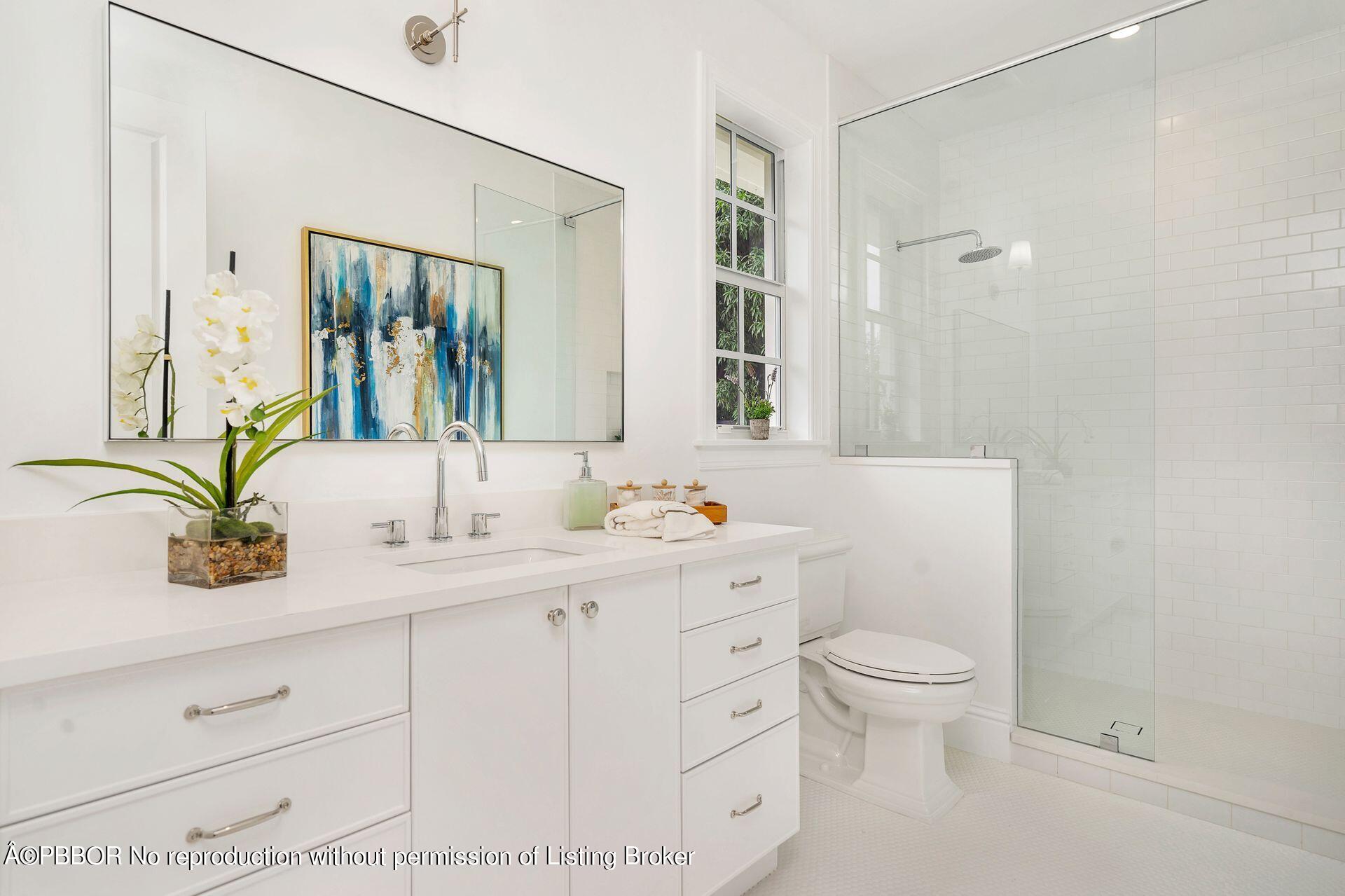 344 Churchill Road West Palm Beach, FL 33405 - Photo 21 of 41 a bathroom with a granite countertop toilet sink and mirror