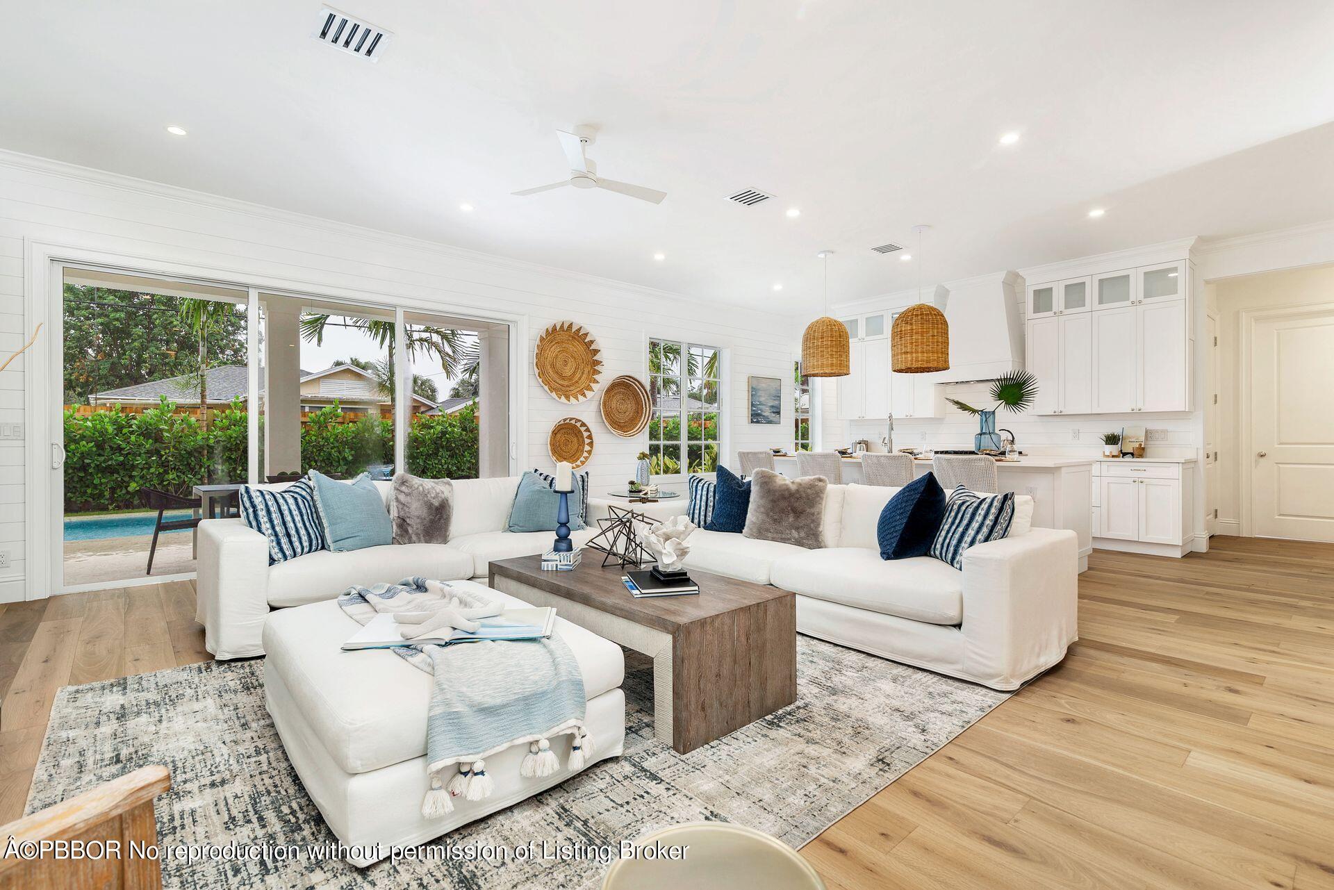 344 Churchill Road West Palm Beach, FL 33405 - Photo 3 of 41 a living room with furniture and a large window