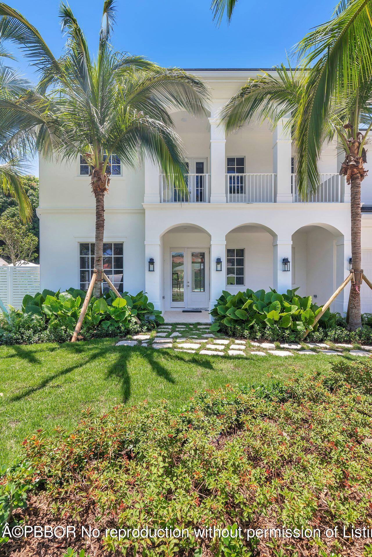 344 Churchill Road West Palm Beach, FL 33405 - Photo 36 of 41 a front view of a house with a garden