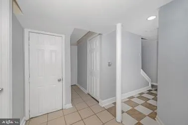 a view of a hallway with entryway