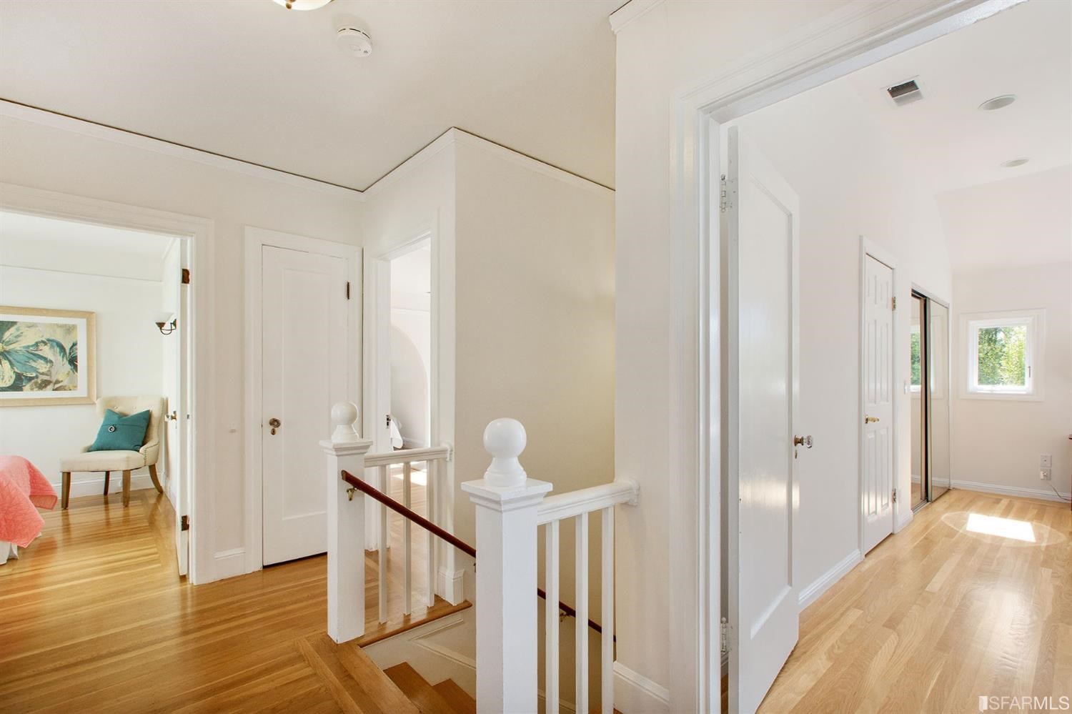 2387 Cedar Street Berkeley, CA 94708 - Photo 12 of 76 a view of a hallway with wooden floor and dining room