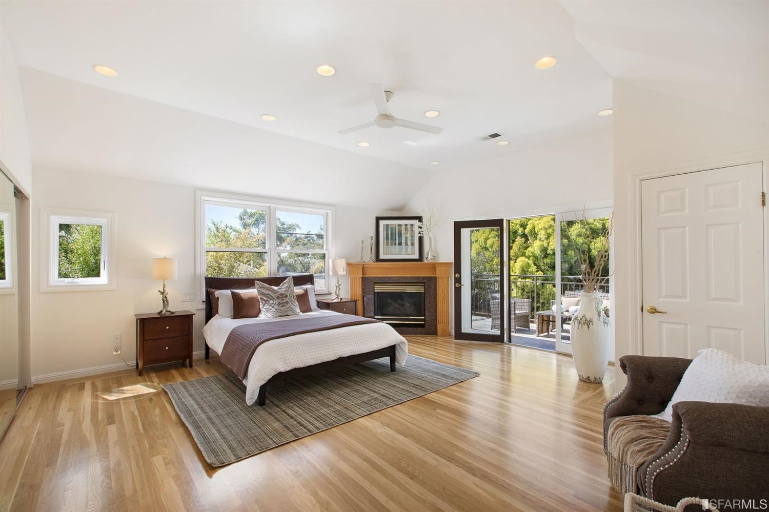 2387 Cedar Street Berkeley, CA 94708 - Photo 13 of 76 a spacious bedroom with a large bed and a couch