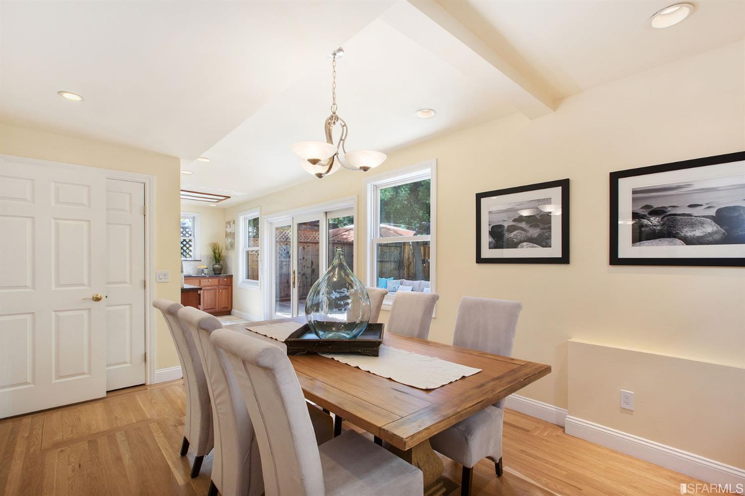 2387 Cedar Street Berkeley, CA 94708 - Photo 47 of 76 a view of a dining room with furniture window and wooden floor