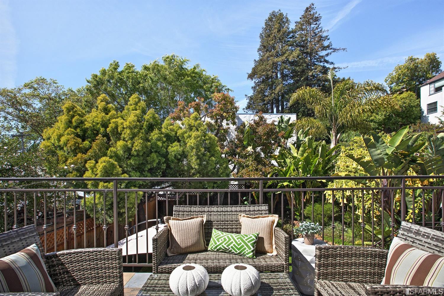 2387 Cedar Street Berkeley, CA 94708 - Photo 59 of 76 a view of a roof deck with couches and wooden floor
