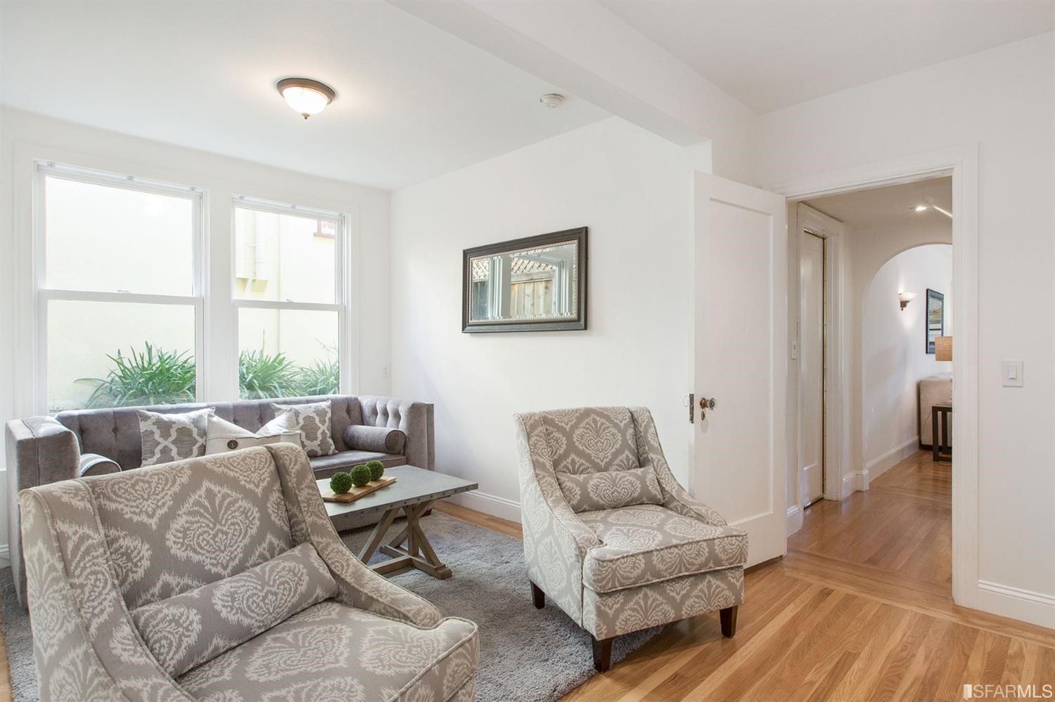 2387 Cedar Street Berkeley, CA 94708 - Photo 10 of 76 a living room with furniture and a large window