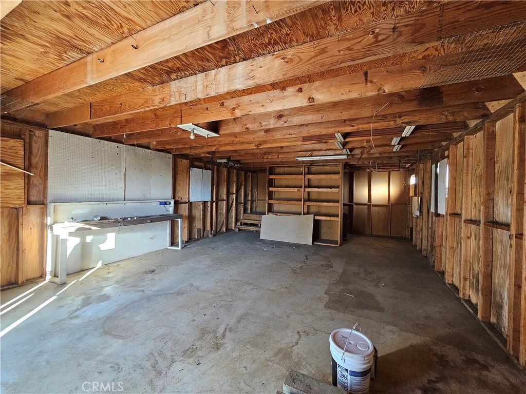 59600 Burnt Valley Road Anza, CA 92539 - Photo 11 of 22 a view of empty room with wooden walls