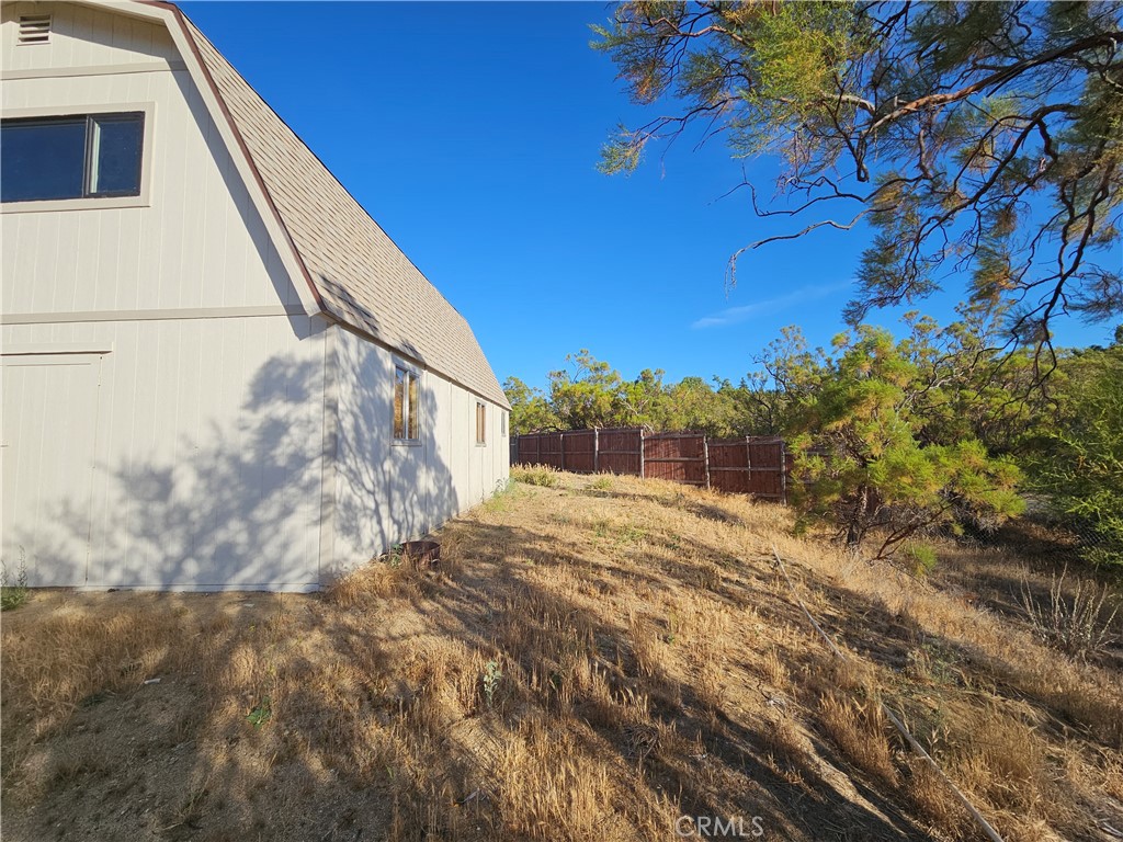 59600 Burnt Valley Road Anza, CA 92539 - Photo 2 of 22 a view of a yard with a tree