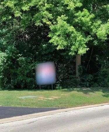 a view of a backyard of a house