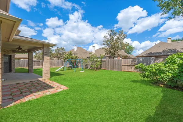 a view of a backyard with garden