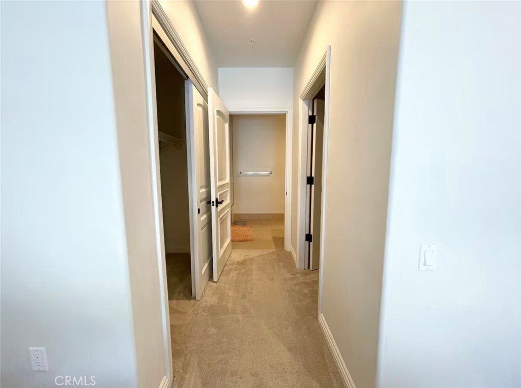 1598 Long Beach Boulevard, Unit 412 Long Beach, CA 90813 - Photo 24 of 31 a view of a hallway with wooden shelves