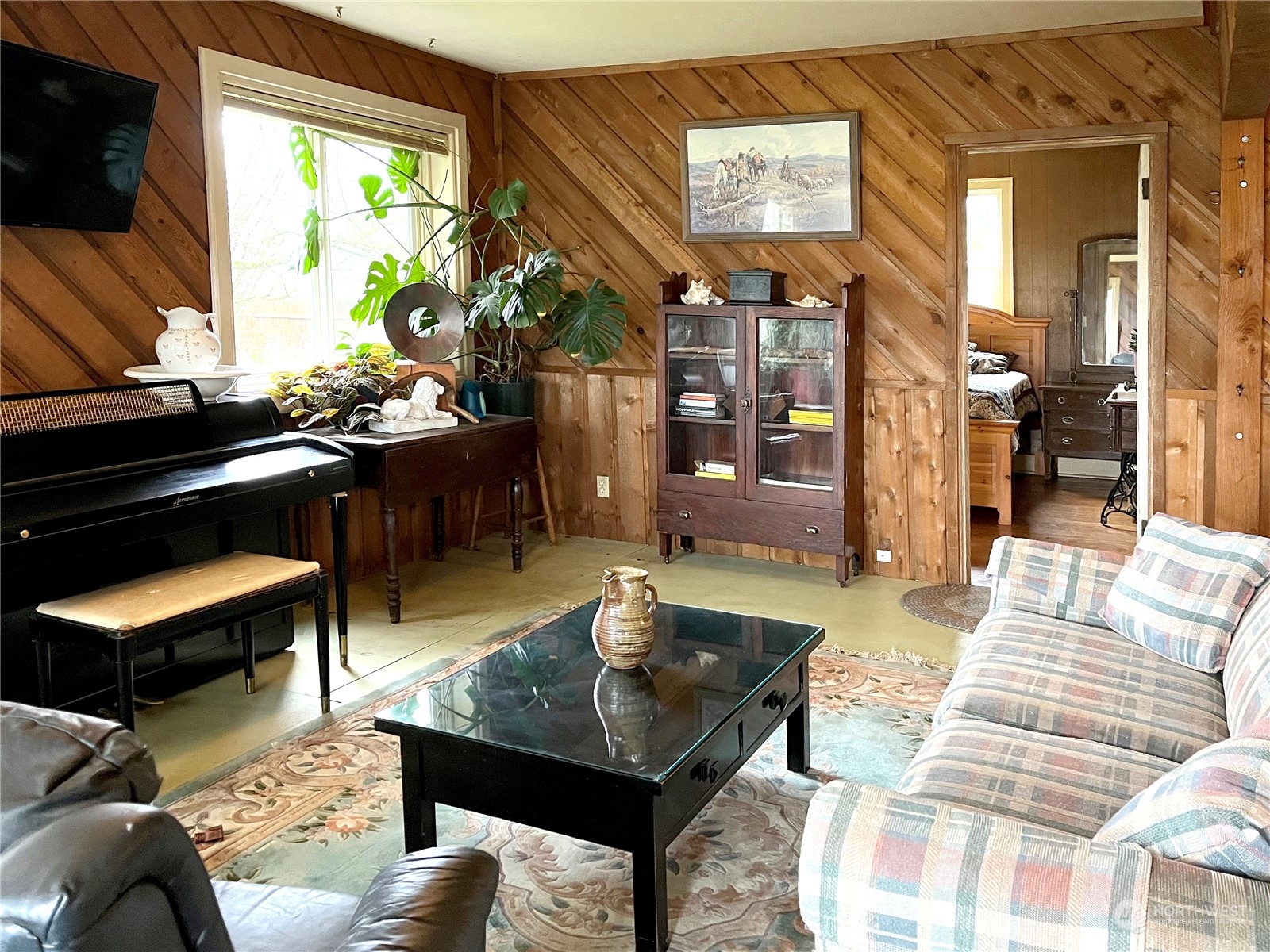 811 Nooksack Road Nooksack, WA 98276 - Photo 6 of 26 a living room with furniture and a floor to ceiling window