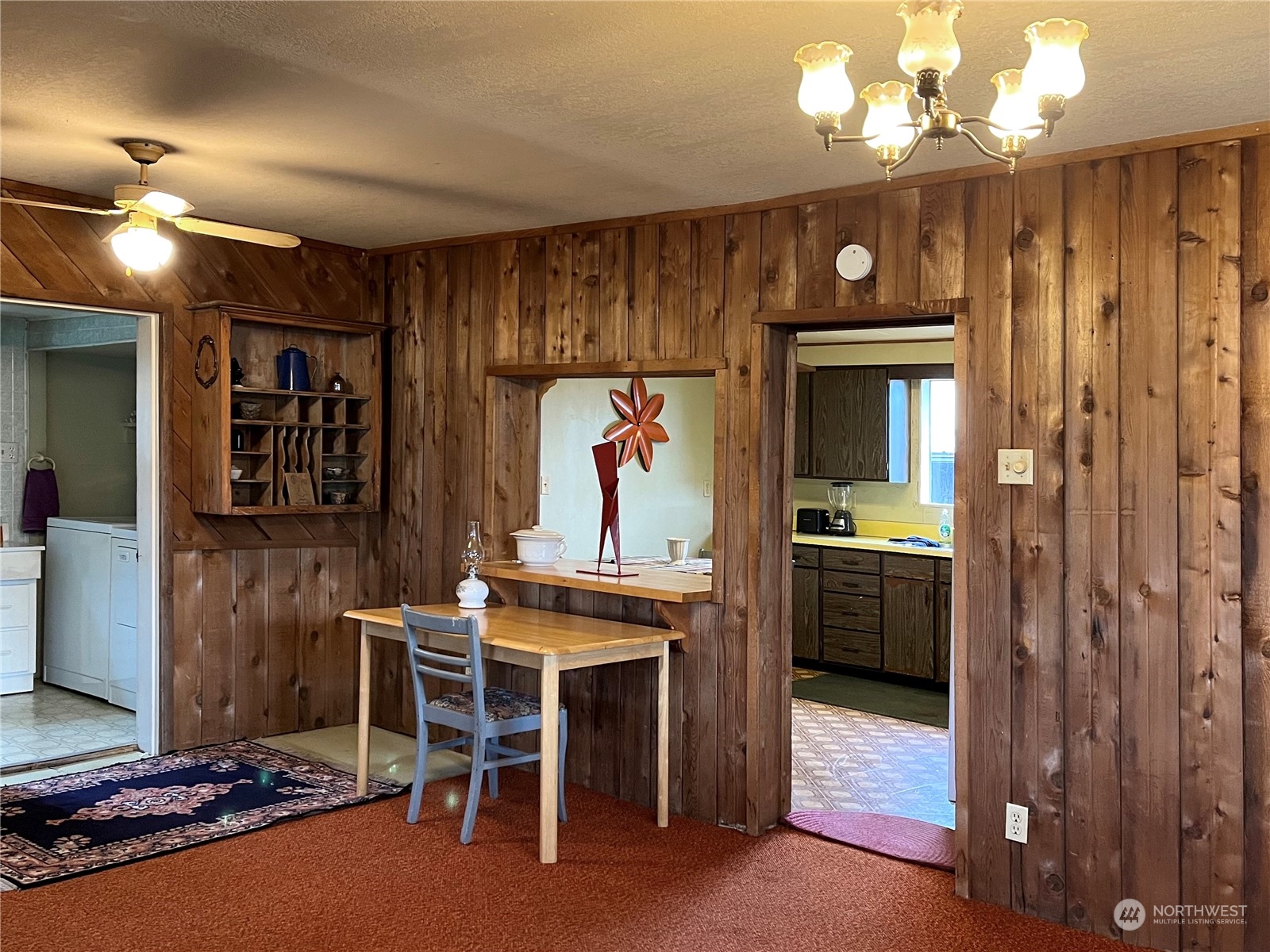 811 Nooksack Road Nooksack, WA 98276 - Photo 8 of 26 a view of a dining room with furniture and chandelier