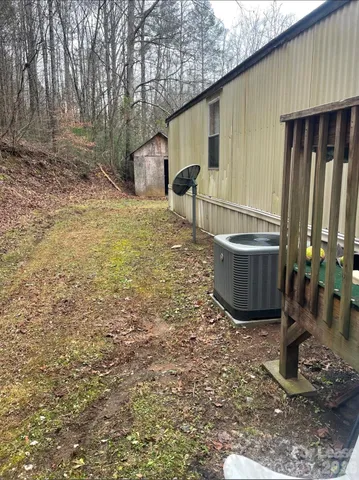 a view of a backyard of the house