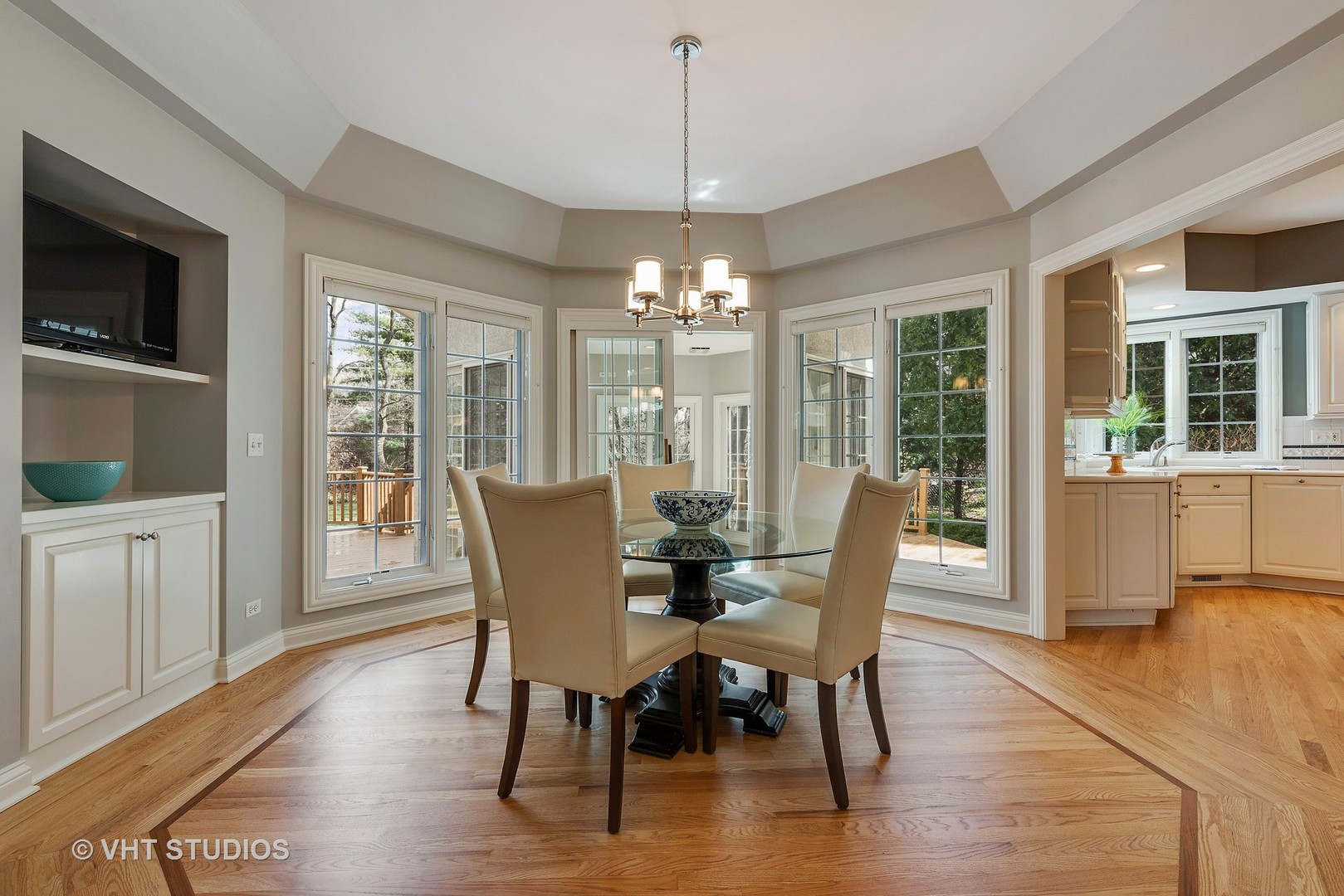 1426 Linden Road Northbrook, IL 60062 - Photo 13 of 27 a view of a dining room with furniture window and wooden floor