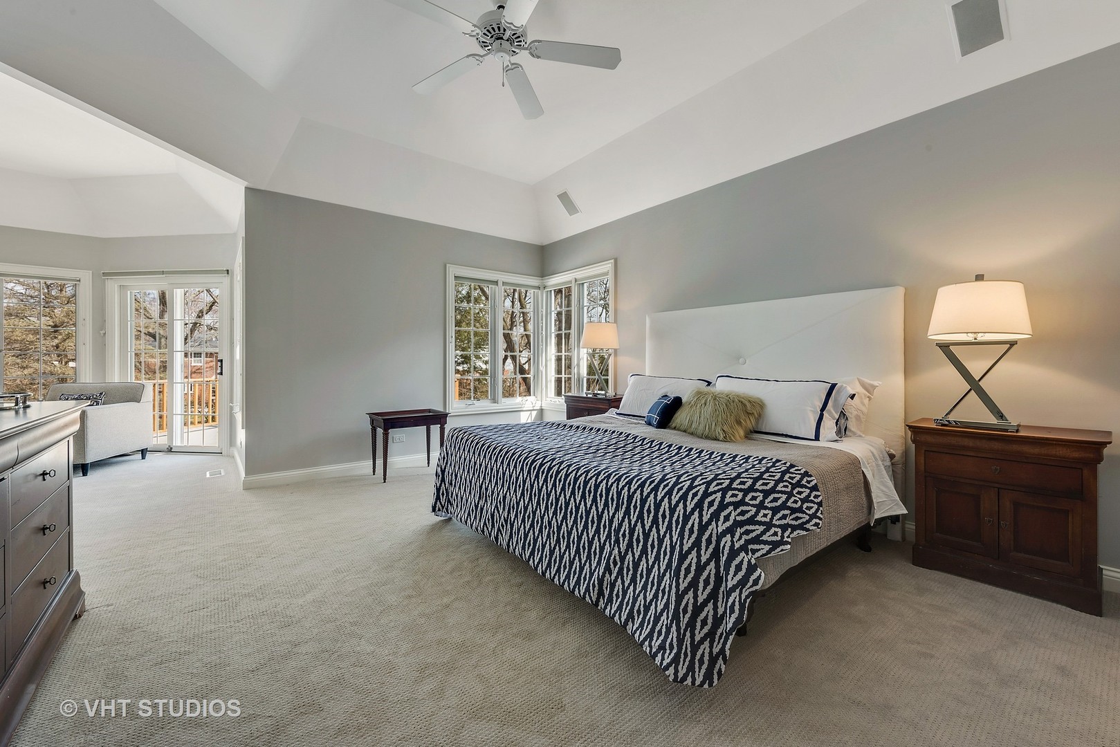 1426 Linden Road Northbrook, IL 60062 - Photo 15 of 27 a spacious bedroom with a bed and a chandelier