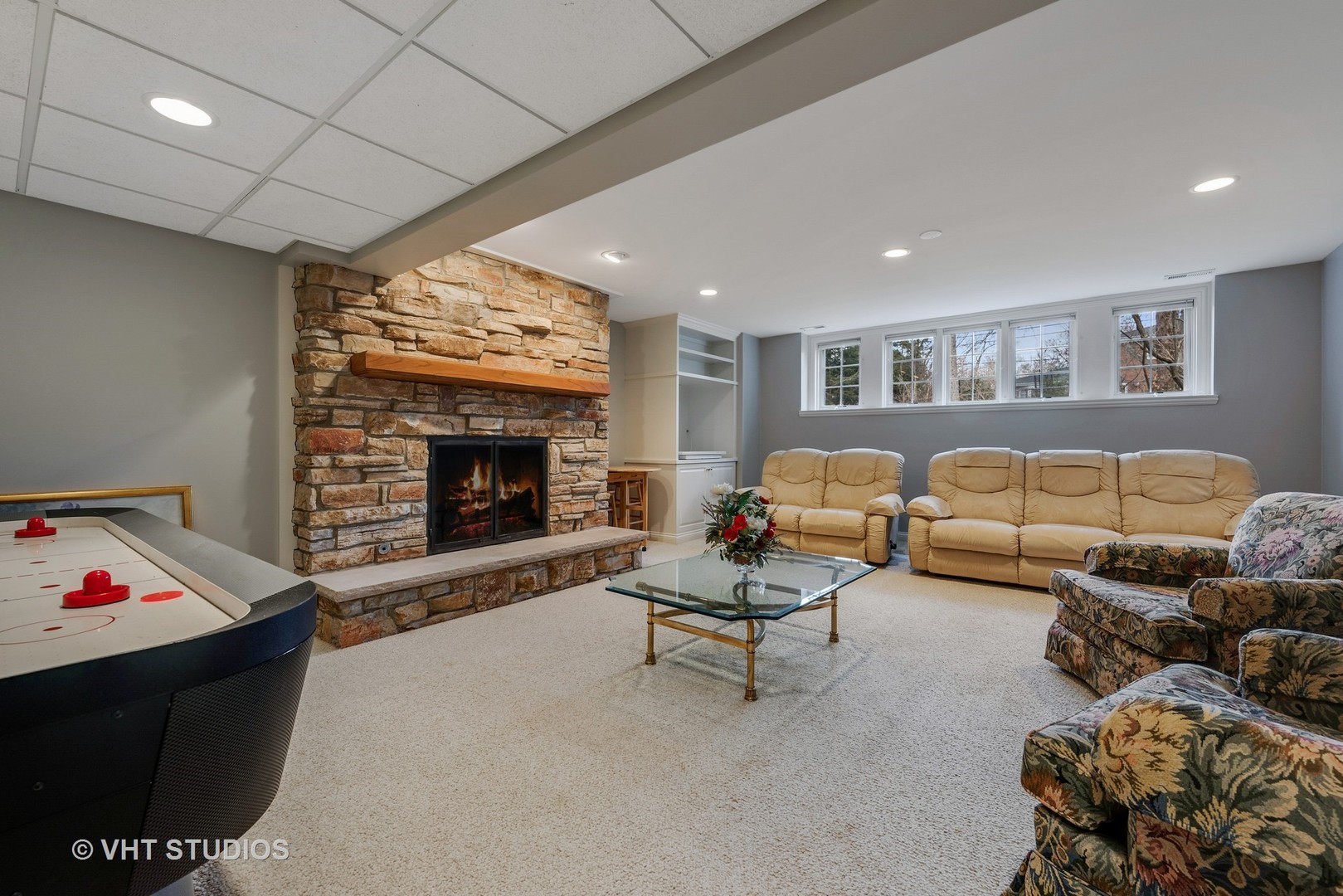1426 Linden Road Northbrook, IL 60062 - Photo 19 of 27 a living room with furniture and a fireplace