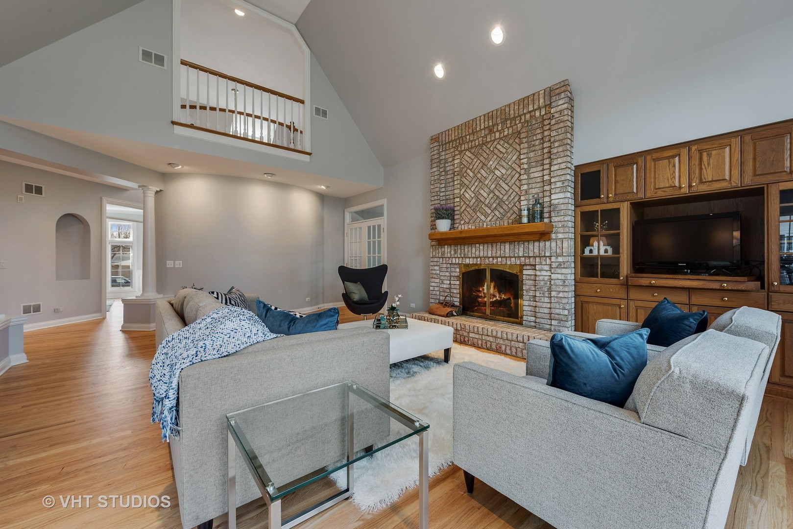 1426 Linden Road Northbrook, IL 60062 - Photo 7 of 27 a living room with furniture and a flat screen tv