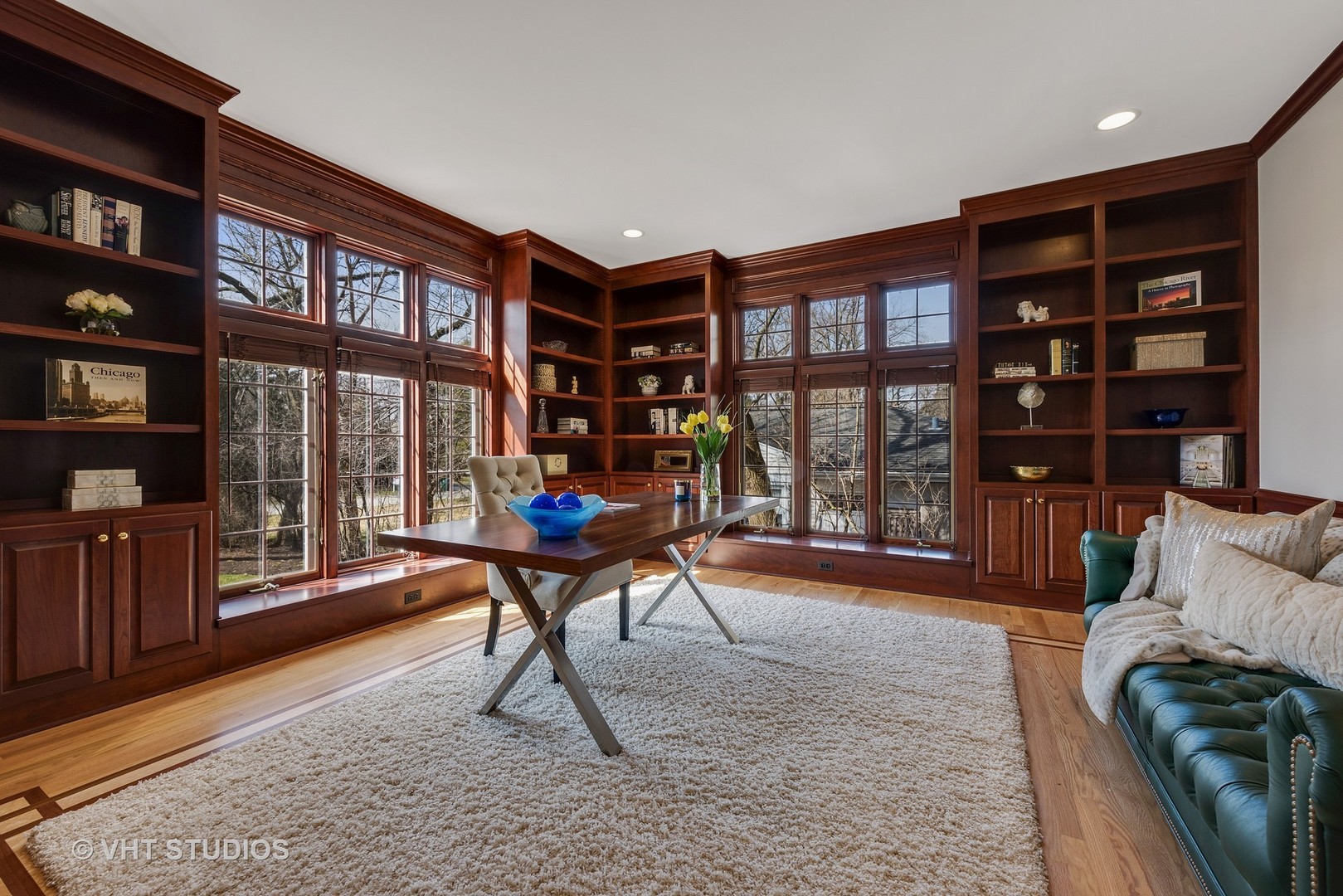1426 Linden Road Northbrook, IL 60062 - Photo 9 of 27 a living room with furniture a rug and a book shelf