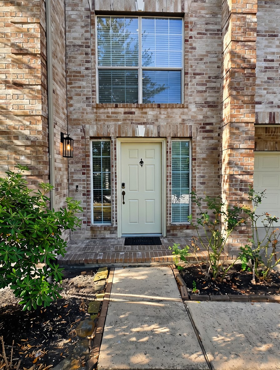 3002 Mayday Run Court Spring, TX 77373 - Photo 3 of 31 Close-up view of the welcoming front entry, highlighting the home's inviting entrance and covered doorway.