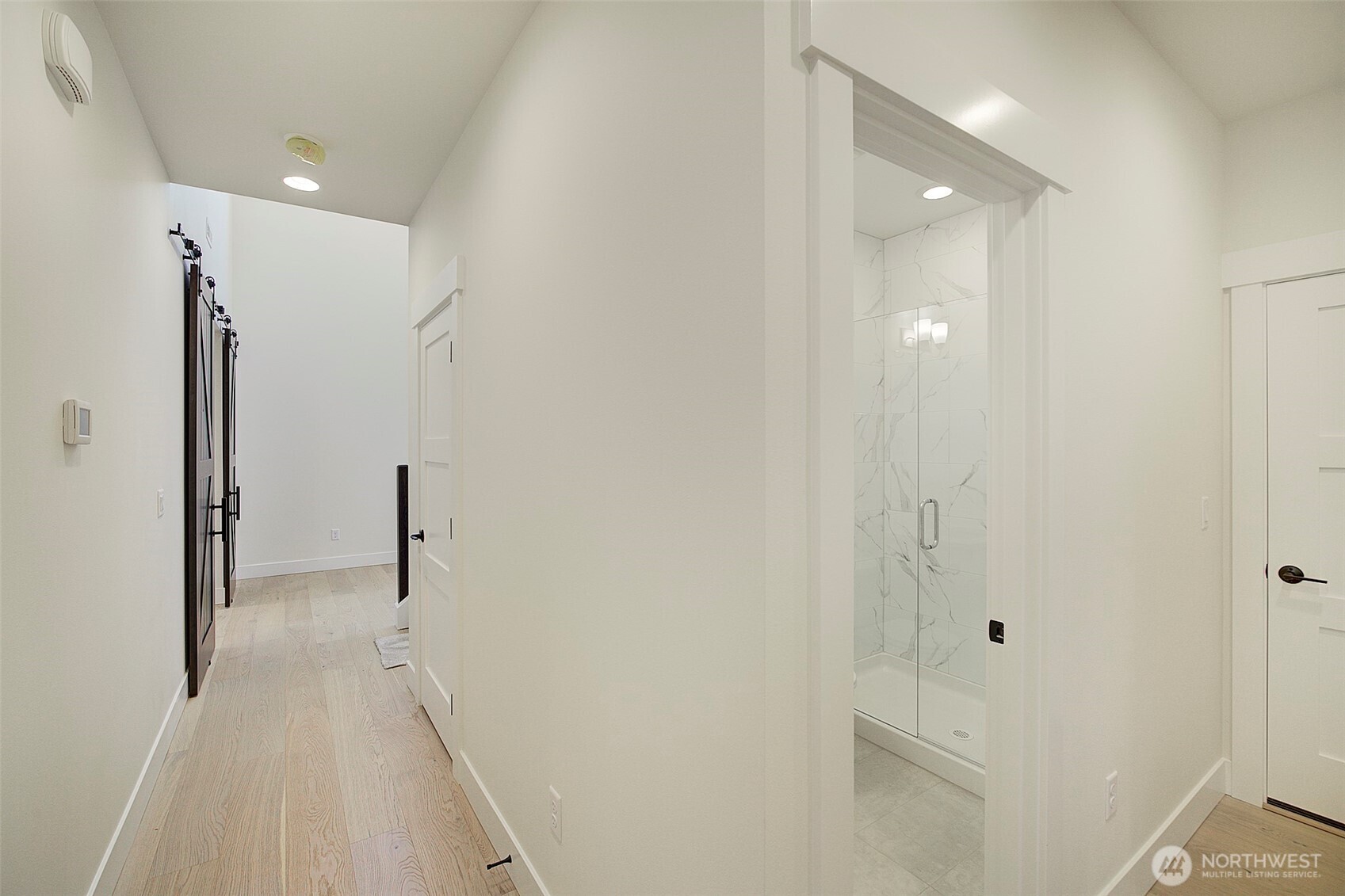727 Covington Avenue Snohomish, WA 98290 - Photo 11 of 36 a view of a hallway with a white door