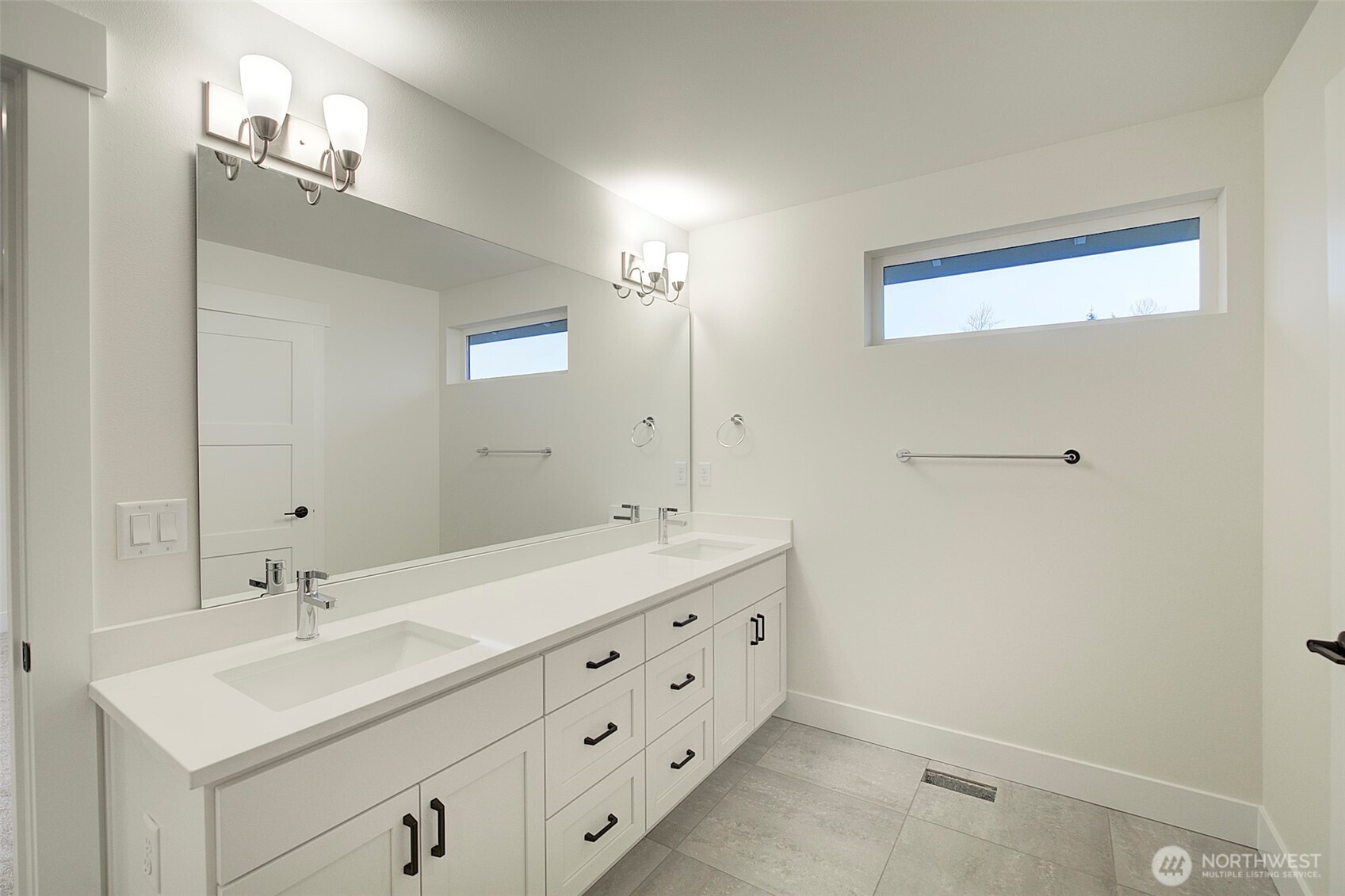 727 Covington Avenue Snohomish, WA 98290 - Photo 19 of 36 a bathroom with a double vanity sink and mirror