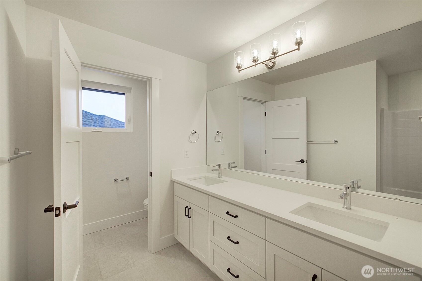 727 Covington Avenue Snohomish, WA 98290 - Photo 26 of 36 a bathroom with a sink double vanity granite tub and shower