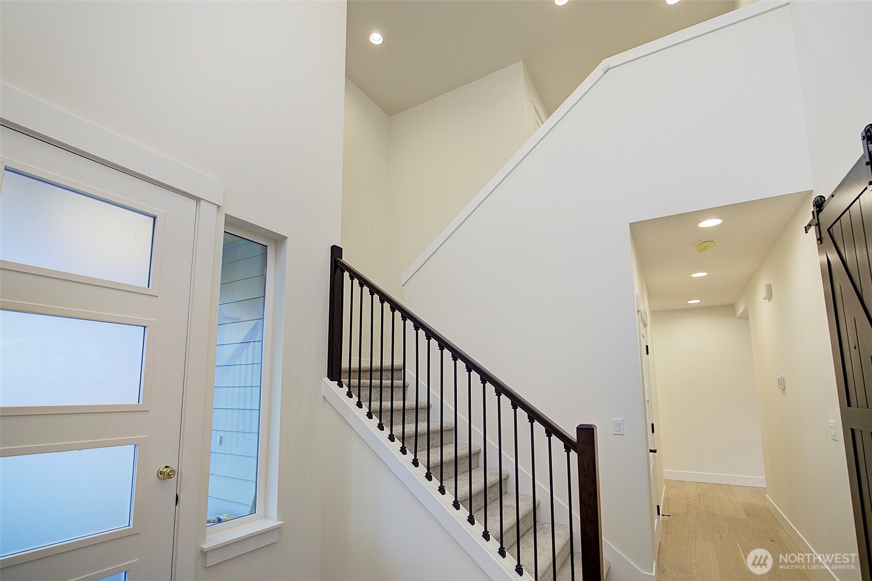 727 Covington Avenue Snohomish, WA 98290 - Photo 32 of 36 a view of a hallway with a staircase
