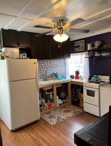 378 Green Forest Road, Unit 15 Dunlap, TN 37327 - Photo 3 of 15 a kitchen with stainless steel appliances granite countertop a refrigerator a stove top oven a sink and dishwasher