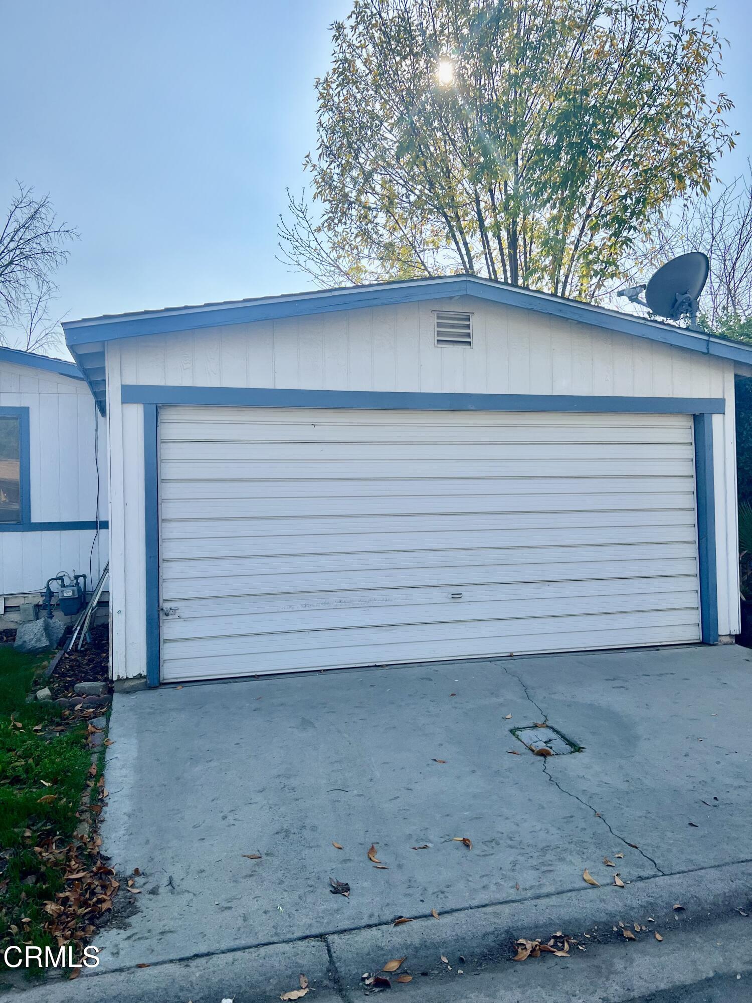 601 Pacheco Road, Unit 29 Bakersfield, CA 93307 - Photo 2 of 15 garage front door