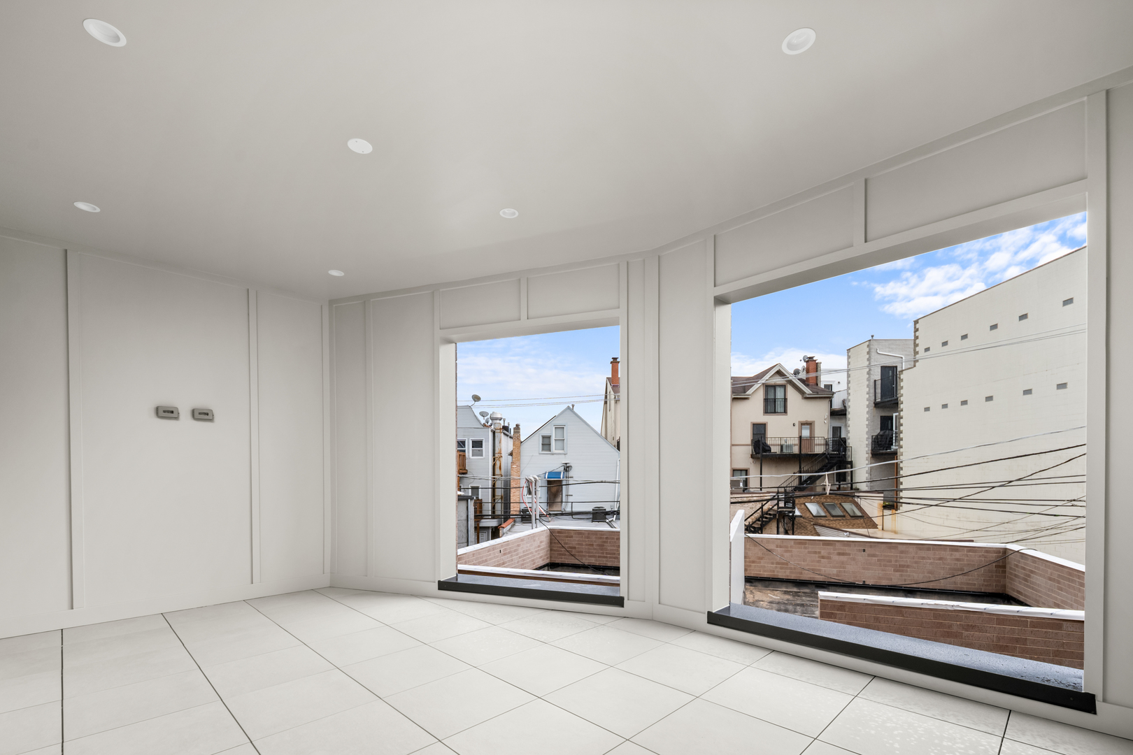 2832 North Racine Avenue, Unit 2W Chicago, IL 60657 - Photo 14 of 31 a view of front door and bedroom