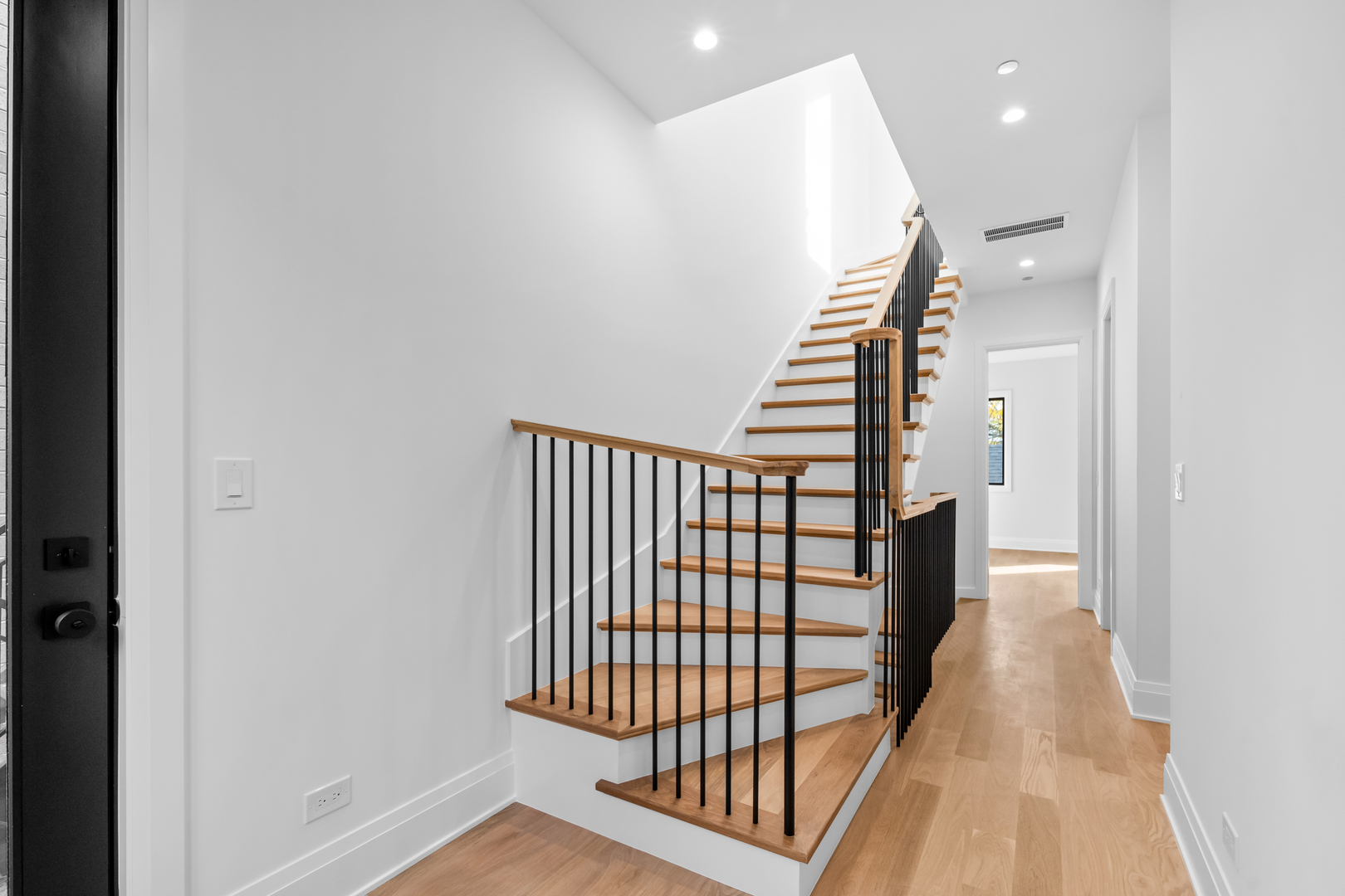 2832 North Racine Avenue, Unit 2W Chicago, IL 60657 - Photo 15 of 31 a view of a hallway with stairs