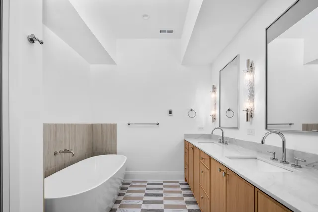 a bathroom with a sink and shower