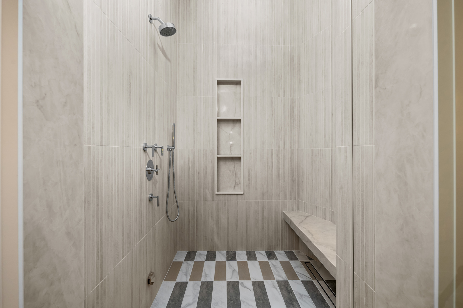 2832 North Racine Avenue, Unit 2W Chicago, IL 60657 - Photo 19 of 31 a bathroom with a sink and shower