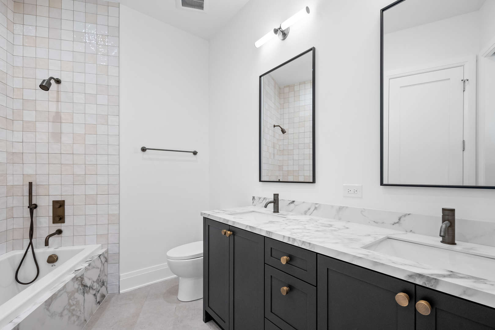 2832 North Racine Avenue, Unit 2W Chicago, IL 60657 - Photo 24 of 31 a bathroom with a granite countertop sink a toilet and a mirror